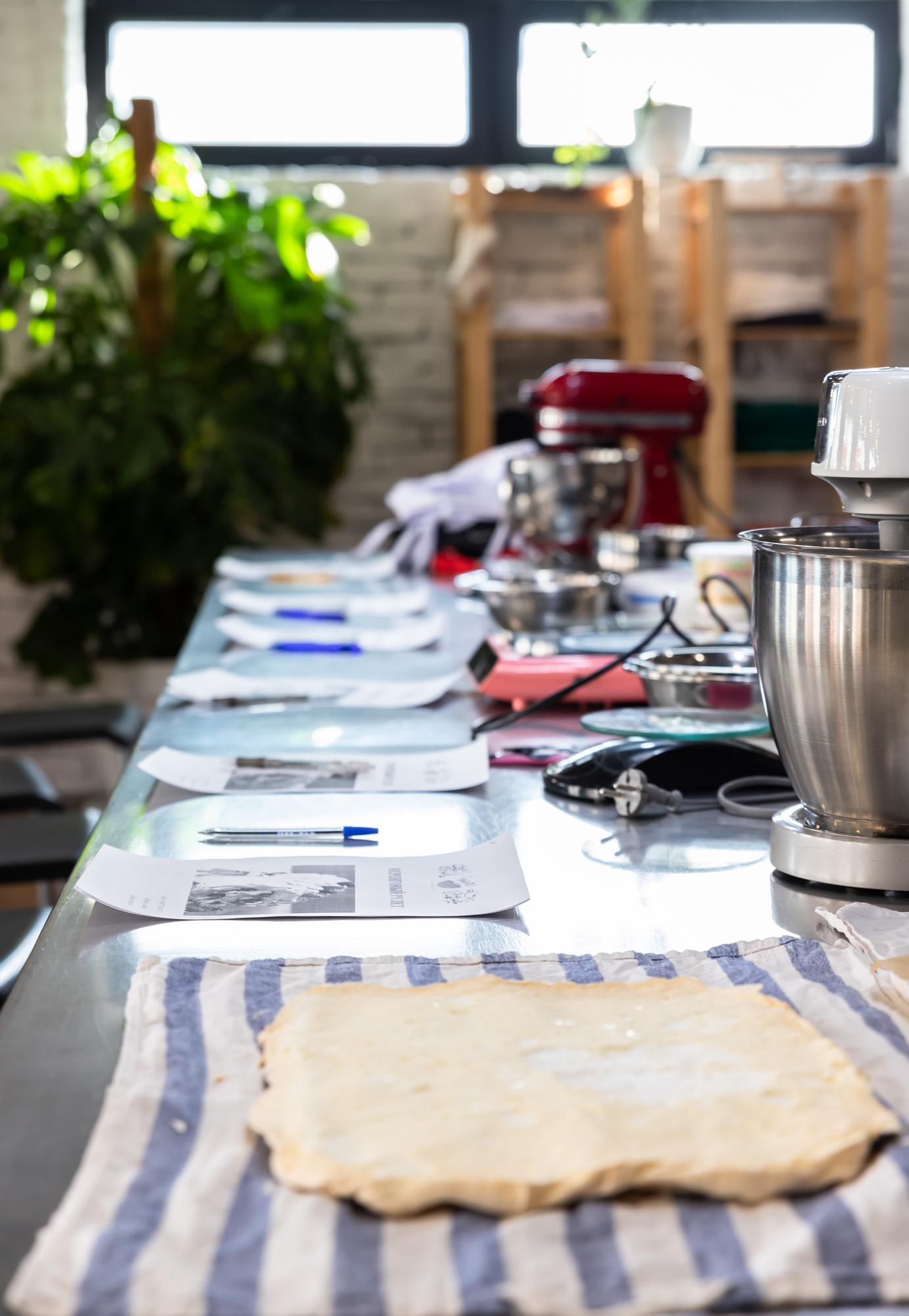 Workshop bench with tools and annotated recipe